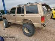 ✅ 1999 Jeep Cherokee Limited • VIN: 1J4FF78S8XL552596 • Lot: 49181115. Listed on Copart with 141,434 mi. Free auction sales archive from the USA and detailed vehicle history report at DreamBid. Image 2.