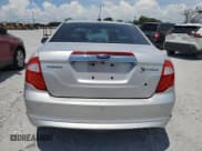 ✅ 2010 Ford Fusion Hybrid • VIN: 3FADP0L39AR182968 • Lot: 66120535. Wystawiony na Copart z przebiegiem 105 952 mil. Bezpłatny archiwum sprzedaży aukcyjnych z USA i szczegółowy raport historii pojazdu na DreamBid. Zdjęcie 6.