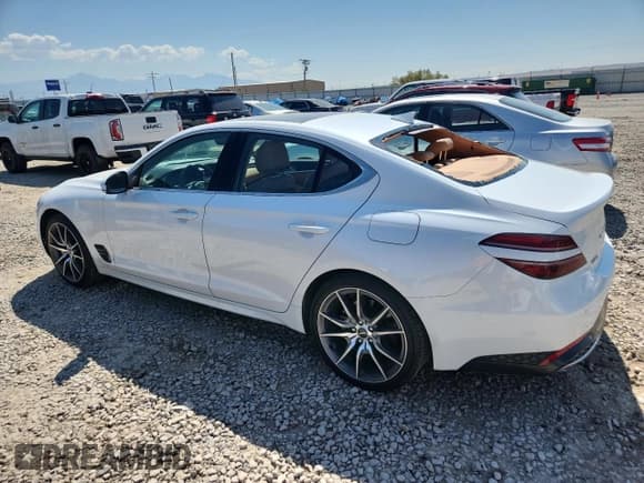 ✅ 2022 Genesis G70 2.0T • VIN: KMTG34TA6NU098387 • Лот: 70874485. Опубликован ранее на Copart с пробегом 49 701 миль. Бесплатный доступ к архиву аукционных продаж из США и подробный отчёт об истории автомобиля на DreamBid. Изображение 2.