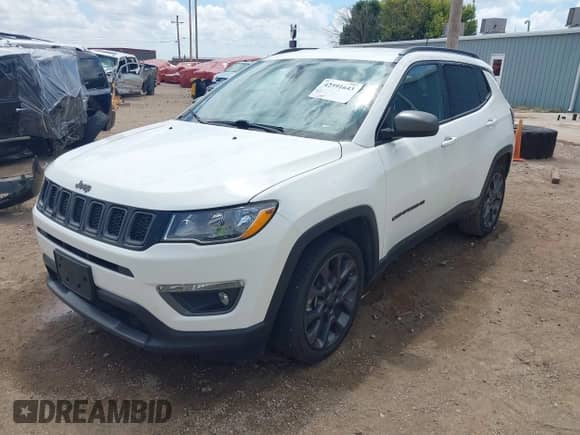 2021 Jeep Compass 80th Anniversary z VIN 3C4NJCEB6MT571564, wystawiony jako IAAI lot #42591643 z przebiegiem 56 999 mil mil oraz . Historia ofert i sprzedaży dostępna na DreamBid. Obrazek 2.