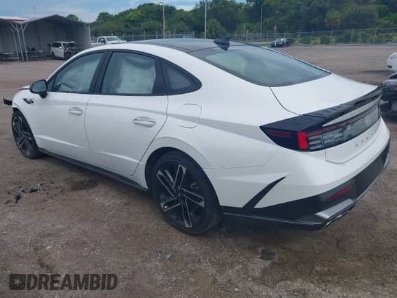 2024 Hyundai Sonata N Line with VIN KMHL54JC2RA418643, listed as a IAAI auction lot 43173088 with 27,398 mi miles and . Bid and sale history available at DreamBid. Image 3.