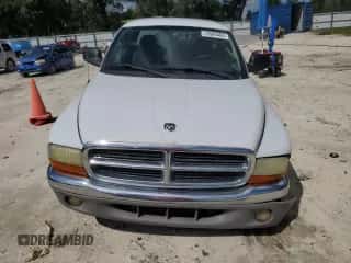 2003 Dodge Dakota SLT z VIN 1D7HL42XX3S333865, wystawiony jako Copart lot #73509404 z przebiegiem 123 515 mil mil oraz Szkoda całkowita • Salvage title. Historia ofert i sprzedaży dostępna na DreamBid. Obrazek 5.