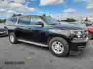 2015 Chevrolet Suburban LT with VIN 1GNSKJKC6FR660894, listed as a Copart auction lot 82732065 with 47,176 mi miles and Salvage title. Bid and sale history available at DreamBid. Image 4.