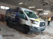 ✅ 2016 Ford Transit Cargo • VIN: 1FTYR2CM3GKA99298 • Lot: 42983180. Listed on IAAI with 127,890 mi. Free auction sales archive from the USA and detailed vehicle history report at DreamBid. Image 14.