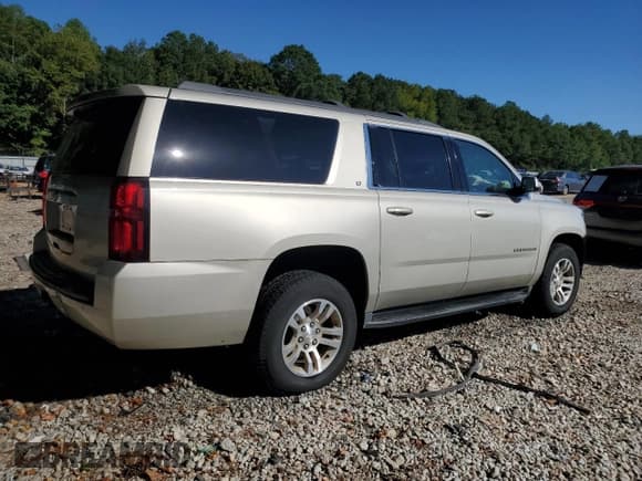 ✅ 2017 Chevrolet Suburban LT • VIN: 1GNSCHKC0HR158097 • Lot: 84901945. Listed on Copart with 123,331 mi. Free auction sales archive from the USA and detailed vehicle history report at DreamBid. Image 3.