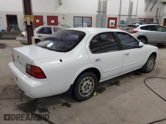 ✅ 1995 Nissan Maxima GLE • VIN: JN1CA21D2ST029124 • Lot: 41642868. Listed on IAAI with 142,337 mi. Free auction sales archive from the USA and detailed vehicle history report at DreamBid. Image 4.