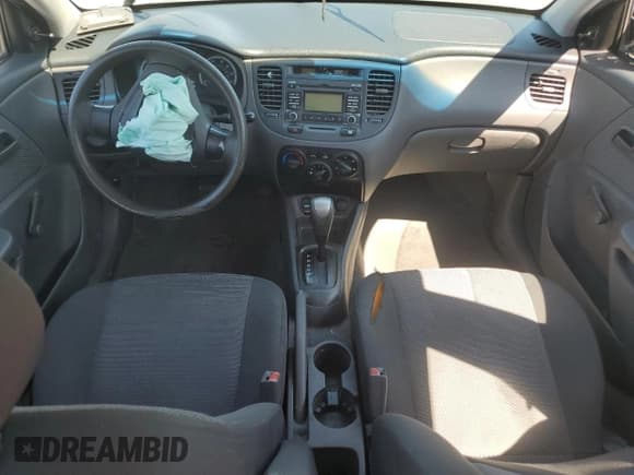 ✅ 2009 Kia Rio LX • VIN: KNADE223196505137 • Лот: 71867015. Опубликован ранее на Copart с пробегом 198 526 миль. Бесплатный доступ к архиву аукционных продаж из США и подробный отчёт об истории автомобиля на DreamBid. Изображение 8.