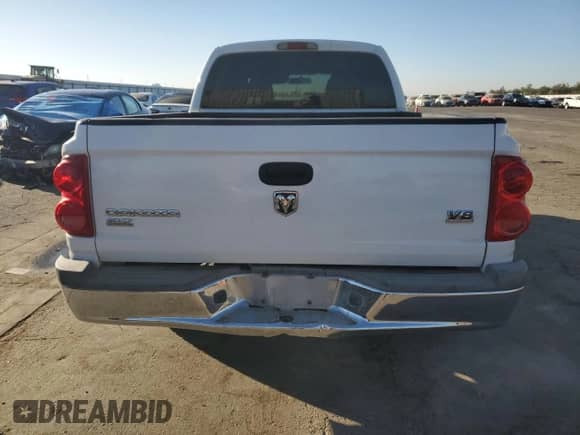 2006 Dodge Dakota SLT с VIN 1D7HE48N46S502721, выставлен на аукционе Copart как лот 77704414 с пробегом 195 514 миль миль и Списание • Salvage title. История ставок и продаж доступна на DreamBid. Изображение 6.