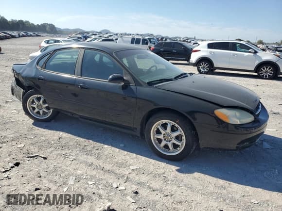 ✅ 2003 Ford Taurus SE Standard • VIN: 1FAFP53U93G179724 • Lot: 84913265. Wystawiony na Copart z przebiegiem 92 731 mil. Bezpłatny archiwum sprzedaży aukcyjnych z USA i szczegółowy raport historii pojazdu na DreamBid. Zdjęcie 4.