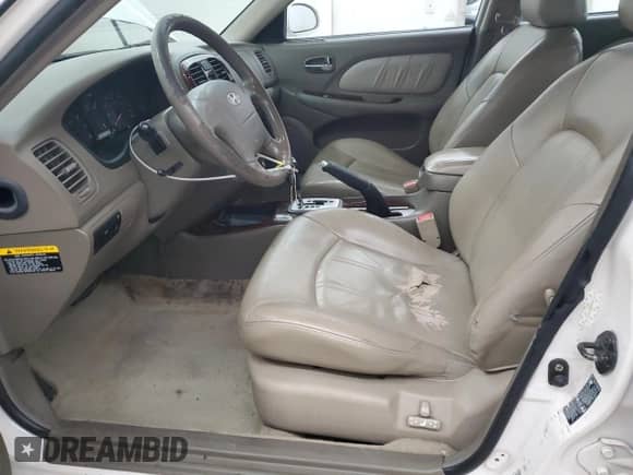 2004 Hyundai Sonata GLS с VIN KMHWF35H74A946133, выставлен на аукционе Copart как лот 48028595 с пробегом 175 589 миль миль и Списание • Salvage title. История ставок и продаж доступна на DreamBid. Изображение 7.