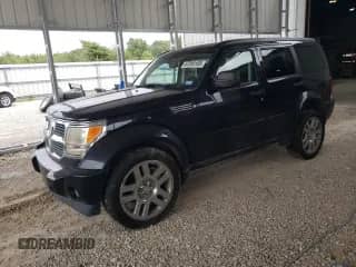 2008 Dodge Nitro SLT with VIN 1D8GU58KX8W118685, listed as a Copart auction lot 67200105 with 265,216 mi miles and Clean title. Bid and sale history available at DreamBid. Image 1.