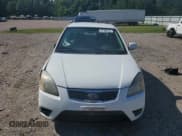 ✅ 2010 Kia Rio LX • VIN: KNADH4A31A6635895 • Lot: 61308434. Wystawiony na Copart z przebiegiem 209 016 mil. Bezpłatny archiwum sprzedaży aukcyjnych z USA i szczegółowy raport historii pojazdu na DreamBid. Zdjęcie 5.