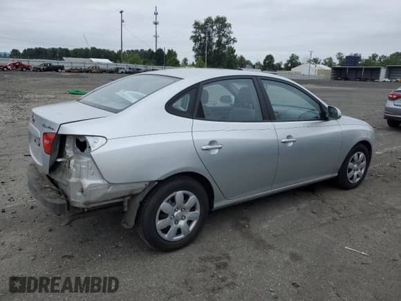 2007 Hyundai Elantra GLS with VIN KMHDU46DX7U084981, listed as a Copart auction lot 61230984 with 93,887 mi miles and Salvage title. Bid and sale history available at DreamBid. Image 3.
