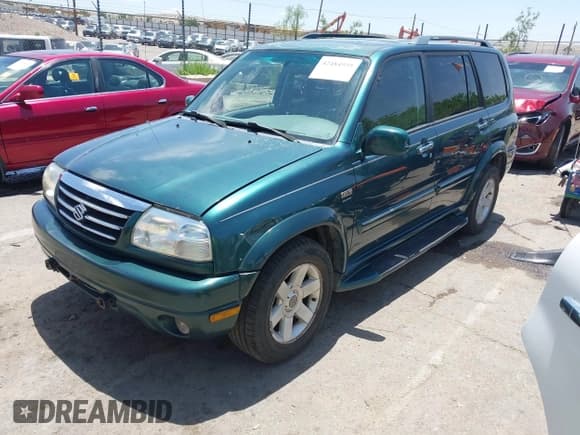 ✅ 2002 Suzuki XL7 Standard • VIN: JS3TX92V624103748 • Lot: 42484935. Listed on IAAI with 211,323 mi. Free auction sales archive from the USA and detailed vehicle history report at DreamBid. Image 2.