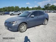 ✅ 2007 Mazda 3 i Touring • VIN: JM1BK32F471718077 • Лот: 69277595. Опубликован ранее на Copart с пробегом 256 154 миль. Бесплатный доступ к архиву аукционных продаж из США и подробный отчёт об истории автомобиля на DreamBid. Изображение 1.