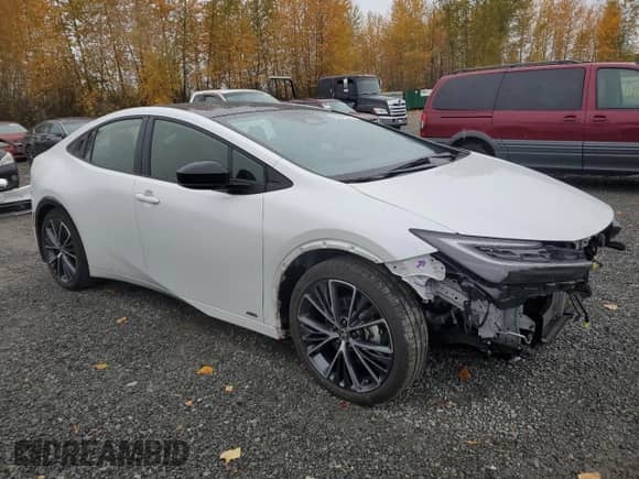 2024 Toyota Prius Limited with VIN JTDADABU7R3014262, listed as a Copart auction lot 90641615 with 25,357 mi miles and Salvage title. Bid and sale history available at DreamBid. Image 4.