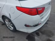 ✅ 2014 Kia Optima LX • VIN: 5XXGM4A71EG303834 • Lot: 42380350. Listed on IAAI with 148,359 mi. Free auction sales archive from the USA and detailed vehicle history report at DreamBid. Image 12.