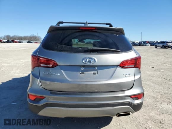 ✅ 2017 Hyundai Santa Fe 2.4L • VIN: 5NMZUDLB9HH050262 • Лот: 41228764. Опубликован ранее на Copart с пробегом 89 741 миль. Бесплатный доступ к архиву аукционных продаж из США и подробный отчёт об истории автомобиля на DreamBid. Изображение 6.
