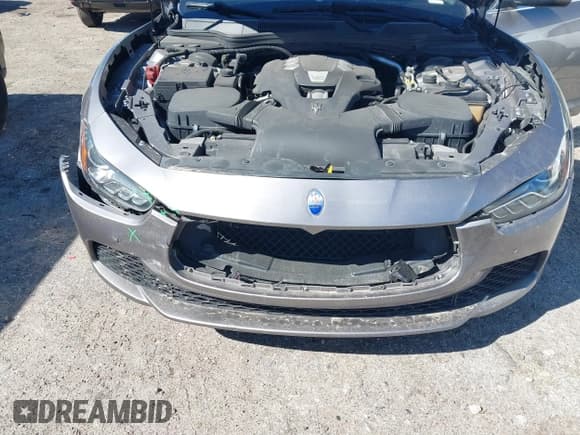 ✅ 2015 Maserati Ghibli • VIN: ZAM57XSA7F1131652 • Lot: 41560759. Listed on IAAI with 103,537 mi. Free auction sales archive from the USA and detailed vehicle history report at DreamBid. Image 6.