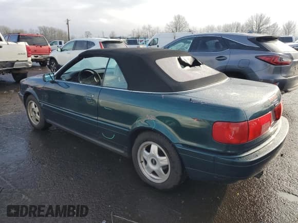 ✅ 1994 Audi Cabriolet • VIN: WAUBL88G0RA003954 • Lot: 87563775. Listed on Copart with 129,555 mi. Free auction sales archive from the USA and detailed vehicle history report at DreamBid. Image 2.