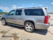 ✅ 2007 Chevrolet Suburban LTZ • VIN: 1GNFC160X7R313925 • Lot: 65341235. Listed on Copart with 221,393 mi. Free auction sales archive from the USA and detailed vehicle history report at DreamBid. Image 2.