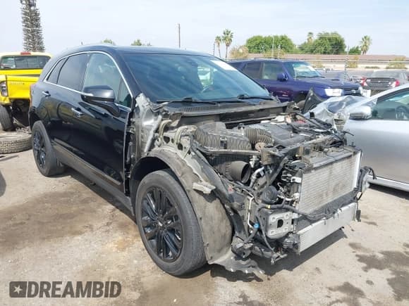 ✅ 2021 Cadillac XT5 FWD Luxury • VIN: 1GYKNAR40MZ140650 • Лот: 43327488. Опубликован ранее на IAAI с пробегом 45 321 миль. Бесплатный доступ к архиву аукционных продаж из США и подробный отчёт об истории автомобиля на DreamBid. Изображение 1.
