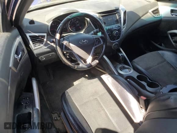 2015 Hyundai Veloster z VIN KMHTC6AD0FU241885, wystawiony jako Copart lot #70447094 z przebiegiem 175 075 mil mil oraz Szkoda całkowita • Salvage title. Historia ofert i sprzedaży dostępna na DreamBid. Obrazek 8.