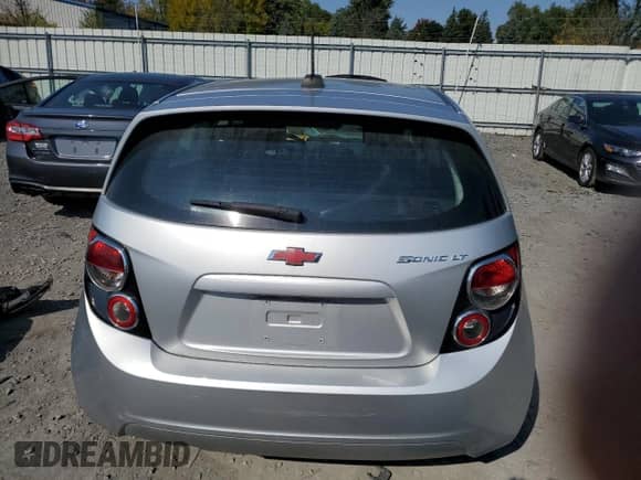 2015 Chevrolet Sonic LT с VIN 1G1JC6SG3F4102721, выставлен на аукционе Copart как лот 74031674 с пробегом 107 763 миль миль и Списание • Salvage title. История ставок и продаж доступна на DreamBid. Изображение 6.