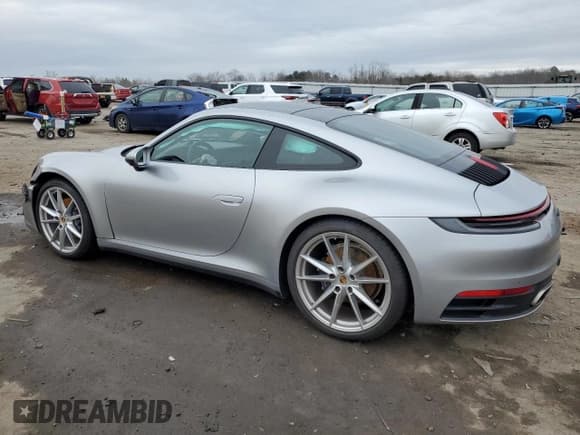 ✅ 2022 Porsche 911 Carrera • VIN: WP0AA2A98NS205474 • Lot: 40023494. Listed on Copart with 9,889 mi. Free auction sales archive from the USA and detailed vehicle history report at DreamBid. Image 2.