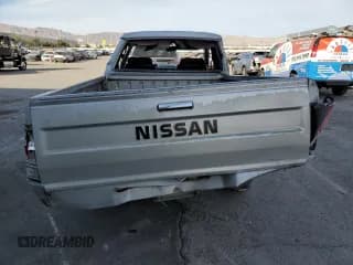 ✅ 1986 Nissan 720 • VIN: JN6ND06SXGW101425 • Lot: 85681764. Wystawiony na Copart z przebiegiem 182 734 mil. Bezpłatny archiwum sprzedaży aukcyjnych z USA i szczegółowy raport historii pojazdu na DreamBid. Zdjęcie 6.