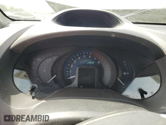 ✅ 2012 Honda Insight • VIN: JHMZE2H34CS006488 • Lot: 54203575. Listed on Copart with Not provided. Free auction sales archive from the USA and detailed vehicle history report at DreamBid. Image 9.