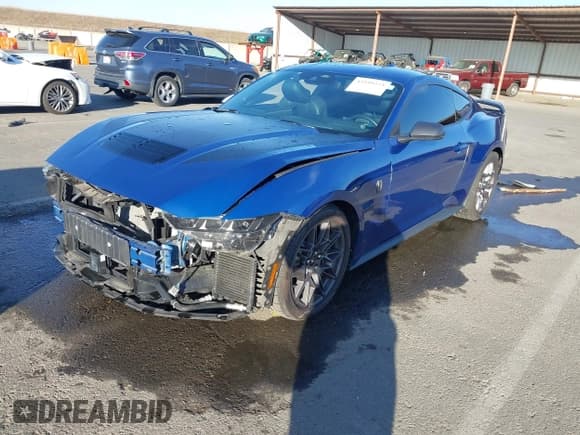 ✅ 2024 Ford Mustang Dark Horse • VIN: 1FA6P8R02R5500514 • Lot: 43599273. Listed on IAAI with 38,811 mi. Free auction sales archive from the USA and detailed vehicle history report at DreamBid. Image 2.