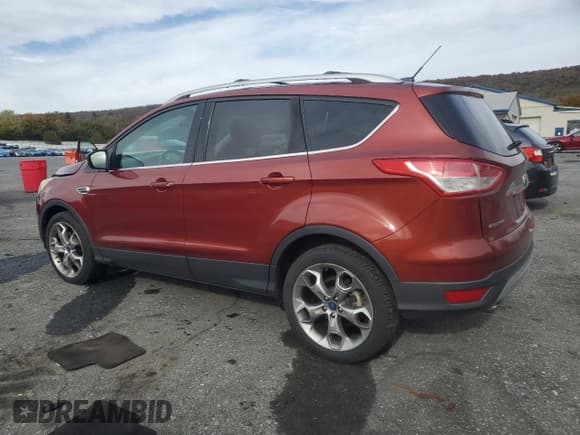 ✅ 2014 Ford Escape Titanium • VIN: 1FMCU0J97EUC57098 • Lot: 90506595. Wystawiony na Copart z przebiegiem 134 361 mil. Bezpłatny archiwum sprzedaży aukcyjnych z USA i szczegółowy raport historii pojazdu na DreamBid. Zdjęcie 2.