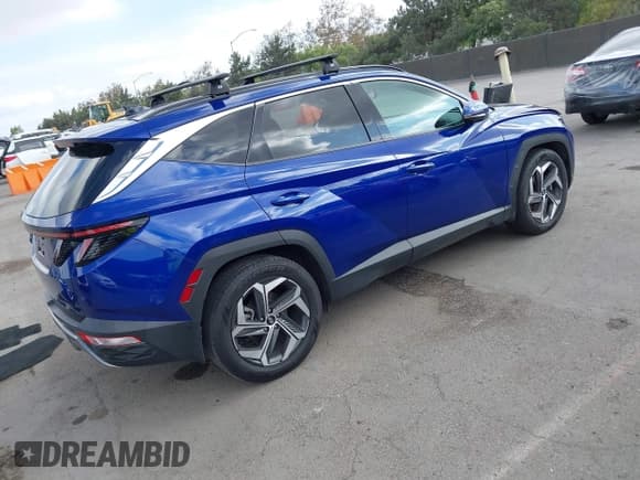 ✅ 2022 Hyundai Tucson Limited • VIN: 5NMJE3AE6NH157587 • Lot: 43341529. Wystawiony na IAAI z przebiegiem 36 496 mil. Bezpłatny archiwum sprzedaży aukcyjnych z USA i szczegółowy raport historii pojazdu na DreamBid. Zdjęcie 4.