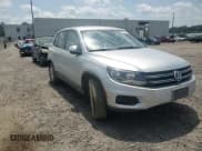 ✅ 2012 Volkswagen Tiguan LE • VIN: WVGAV7AX3CW577127 • Lot: 62021155. Listed on Copart with 103,605 mi. Free auction sales archive from the USA and detailed vehicle history report at DreamBid. Image 14.