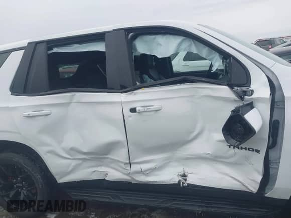 2023 Chevrolet Tahoe RST with VIN 1GNSKRKL5PR124079, listed as a IAAI auction lot 41389636 with 18,920 mi miles and . Bid and sale history available at DreamBid. Image 13.