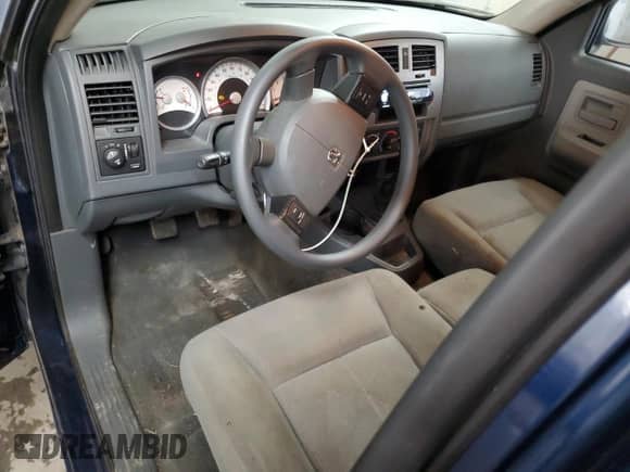 2006 Dodge Dakota SLT z VIN 1D7HE42N36S513461, wystawiony jako Copart lot #70418224 z przebiegiem 76 803 mil mil oraz Szkoda całkowita • Salvage title. Historia ofert i sprzedaży dostępna na DreamBid. Obrazek 8.