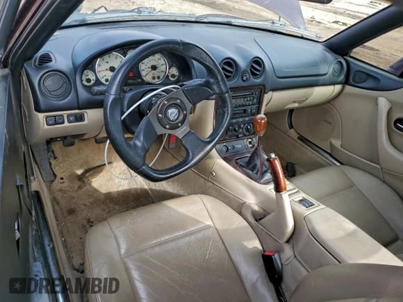 ✅ 2000 Mazda MX-5 Miata • VIN: JM1NB3537Y0147643 • Lot: 93718765. Listed on Copart with 250,900 mi. Free auction sales archive from the USA and detailed vehicle history report at DreamBid. Image 8.