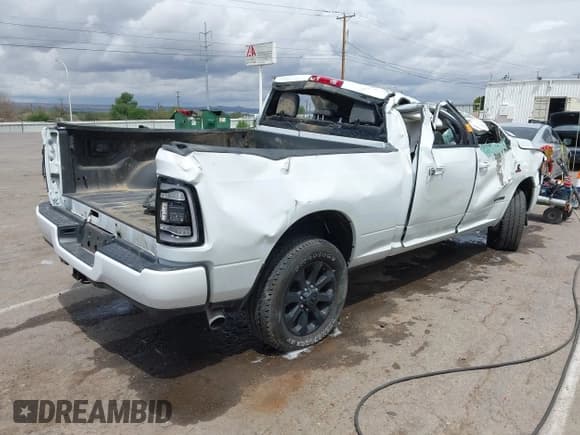✅ 2024 Ram 2500 Laramie • VIN: 3C6UR5FL6RG288306 • Lot: 42022023. Listed on IAAI with Not provided. Free auction sales archive from the USA and detailed vehicle history report at DreamBid. Image 4.