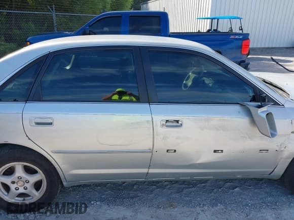 ✅ 2001 Toyota Avalon XLS • VIN: 4T1BF28B91U184563 • Лот: 43325365. Опубликован ранее на IAAI с пробегом 215 088 миль. Бесплатный доступ к архиву аукционных продаж из США и подробный отчёт об истории автомобиля на DreamBid. Изображение 14.