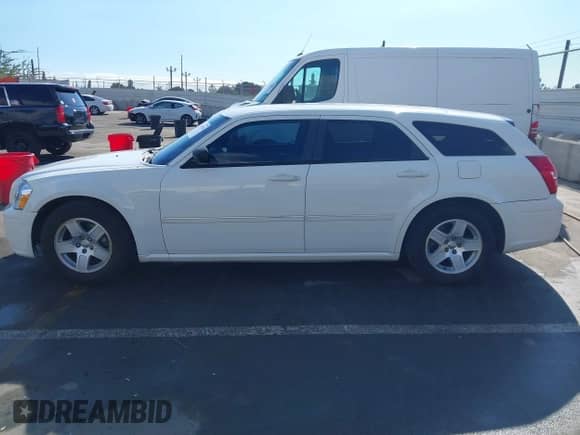 2006 Dodge Magnum с VIN 2D4FV47V66H430367, выставлен на аукционе IAAI как лот 41319330 с пробегом 140 786 миль миль и . История ставок и продаж доступна на DreamBid. Изображение 14.