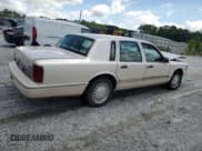 ✅ 1995 Lincoln Town Car Cartier • VIN: 1LNLM83W2SY682976 • Lot: 64985685. Listed on Copart with 225,561 mi. Free auction sales archive from the USA and detailed vehicle history report at DreamBid. Image 3.