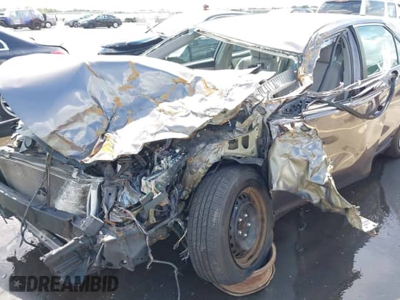 2015 Toyota Camry LE with VIN 4T4BF1FK4FR446399, listed as a IAAI auction lot 43128423 with 82,545 mi miles and . Bid and sale history available at DreamBid. Image 6.