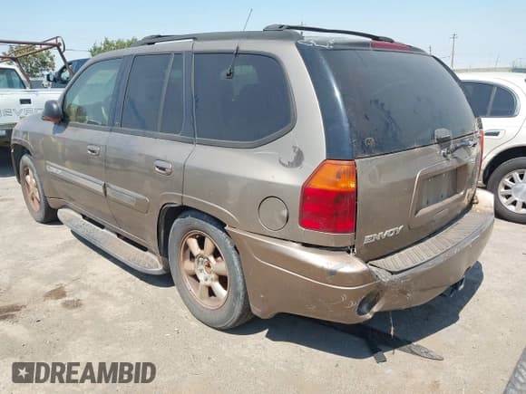✅ 2002 GMC Envoy SLT • VIN: 1GKDT13S122527150 • Лот: 42709149. Опубликован ранее на IAAI с пробегом 225 552 миль. Бесплатный доступ к архиву аукционных продаж из США и подробный отчёт об истории автомобиля на DreamBid. Изображение 3.