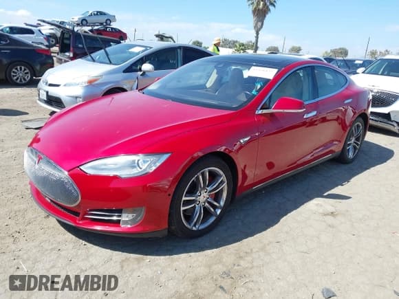 ✅ 2014 Tesla Model S P85D • VIN: 5YJSA1H23EFP64306 • Lot: 43326137. Listed on IAAI with 196,739 mi. Free auction sales archive from the USA and detailed vehicle history report at DreamBid. Image 2.