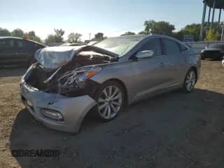 2014 Hyundai Azera Limited с VIN KMHFH4JG4EA361315, выставлен на аукционе Copart как лот 80573325 с пробегом Не указан миль и Списание • Salvage title. История ставок и продаж доступна на DreamBid. Изображение 1.