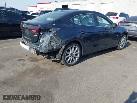 ✅ 2014 Mazda 3 S Grand Touring • VIN: JM1BM1W33E1210937 • Лот: 42747125. Опубликован ранее на IAAI с пробегом 110 205 миль. Бесплатный доступ к архиву аукционных продаж из США и подробный отчёт об истории автомобиля на DreamBid. Изображение 4.