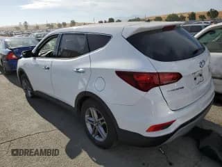 ✅ 2018 Hyundai Santa Fe 2.4L • VIN: 5NMZTDLB4JH083792 • Лот: 62271733. Опубликован ранее на Copart с пробегом Не указан. Бесплатный доступ к архиву аукционных продаж из США и подробный отчёт об истории автомобиля на DreamBid. Изображение 2.