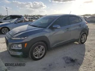 ✅ 2019 Hyundai Kona SE • VIN: KM8K12AA3KU235301 • Лот: 76744274. Опубликован ранее на Copart с пробегом 87 143 миль. Бесплатный доступ к архиву аукционных продаж из США и подробный отчёт об истории автомобиля на DreamBid. Изображение 1.