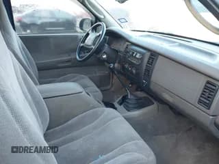 ✅ 2003 Dodge Dakota SLT • VIN: 1D7HL42N93S196397 • Lot: 42105857. Wystawiony na IAAI z przebiegiem 159 690 mil. Bezpłatny archiwum sprzedaży aukcyjnych z USA i szczegółowy raport historii pojazdu na DreamBid. Zdjęcie 5.